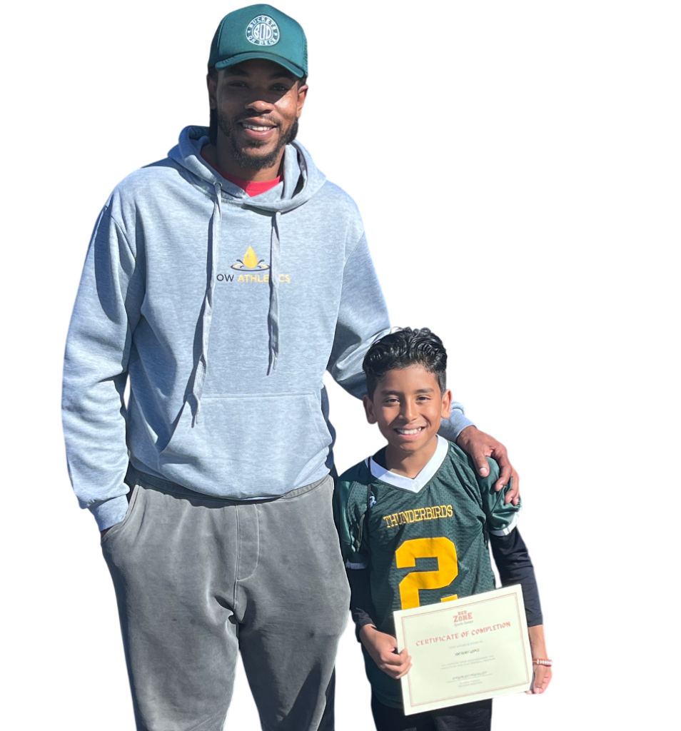 A mentor smiling alongside a young boy proudly holding a certificate, symbolizing the Power of Water Foundation’s commitment to empowering children and celebrating community success.